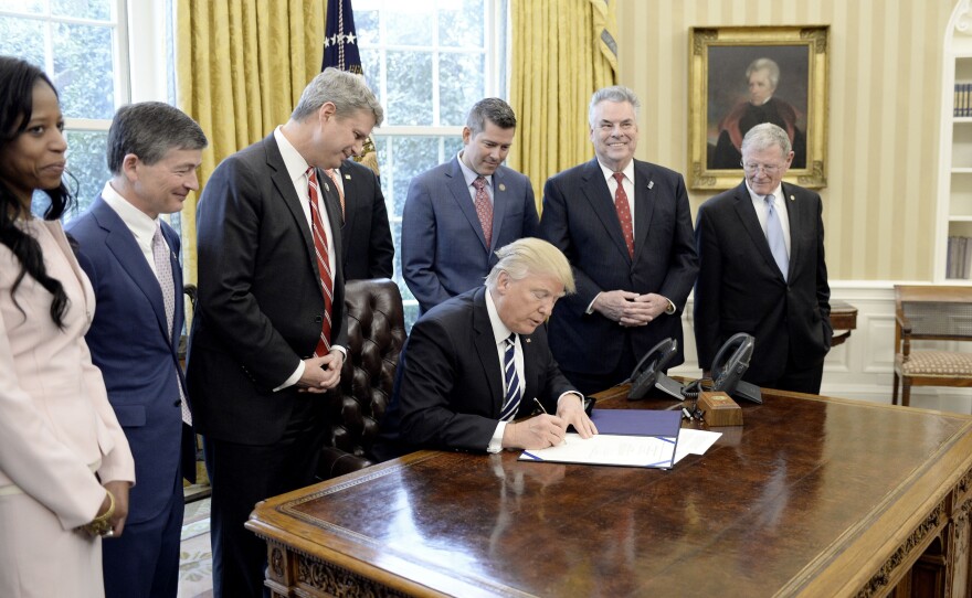 President Donald Trump signs a bill repealing a rule passed last July that required oil, gas and mining companies to disclose payments to overseas governments. The rule was meant to promote transparency. Critics of the repeal argue it served as an important national security tool since corruption often leads to violence, instability and terrorism.