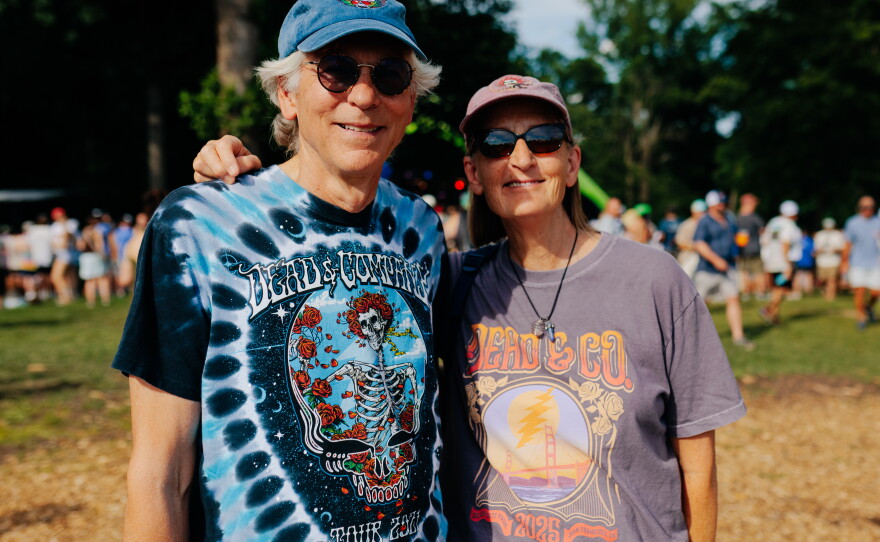 Karen Hohne, 67, and her husband Donald Hone, 29, pose for a photo at the All Good Now festival at Merriweather Post Pavilion. Karen's first concert was the Grateful Dead at Merriweather Post Pavilion in the 1980s in the parking lot. "I just love the culture, I love how kind people are and how fun it is and it's just a good vibe" she said.