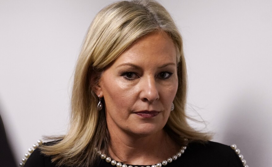 Oakland County prosecutor Karen McDonald leaves after addressing the media in her office, Friday, Dec. 3, 2021, in Pontiac, Mich.