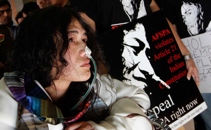 Known as the "Iron Lady of Manipur," Sharmila arrives in New Delhi in March 2013, more than 12 years into her hunger strike. She was called into a Delhi court after being accused of attempting suicide.