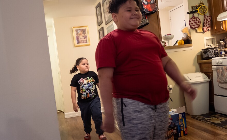 Yariel with his older brother Dylan, 8 at home in Takoma, Md.