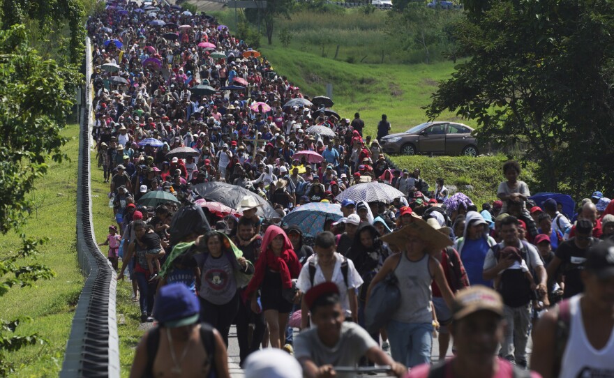 Migrants arrive in Villa Comaltitlan, Chiapas state, Mexico, on Oct. 27.