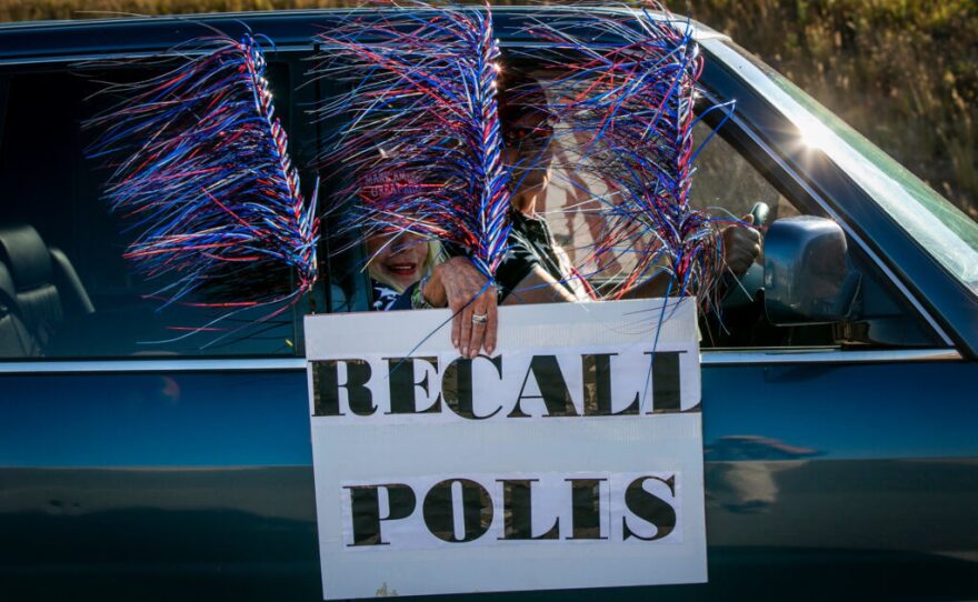 An event at Bandimere Speedway in Morrison, Colo., billed as a "COVID Chaos" protest against emergency public health rules issued by Gov. Jared Polis to deal with the COVID-19 pandemic. Speakers at the rally derided the governor's actions.