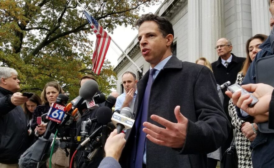 Josh Koskoff, a lawyer representing the families of Sandy Hook shooting victims, speaks outside the Connecticut Supreme Court in this file photo from 2017.