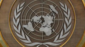 FILE - The United Nations logo is seen inside the 79th session of the United Nations General Assembly, Tuesday, Sept. 24, 2024.