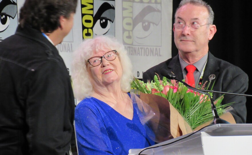 Jackie Estrada (center) announced she was stepping down as administrator of the Eisner Awards after 35 years. July 25, 2025