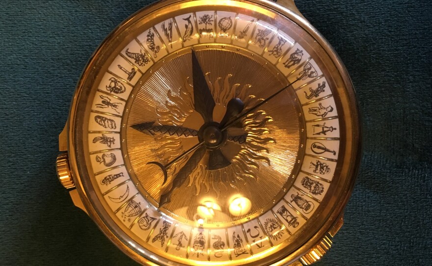 Pullman's own personal aletheiometer — the magical truth-telling device from his books.