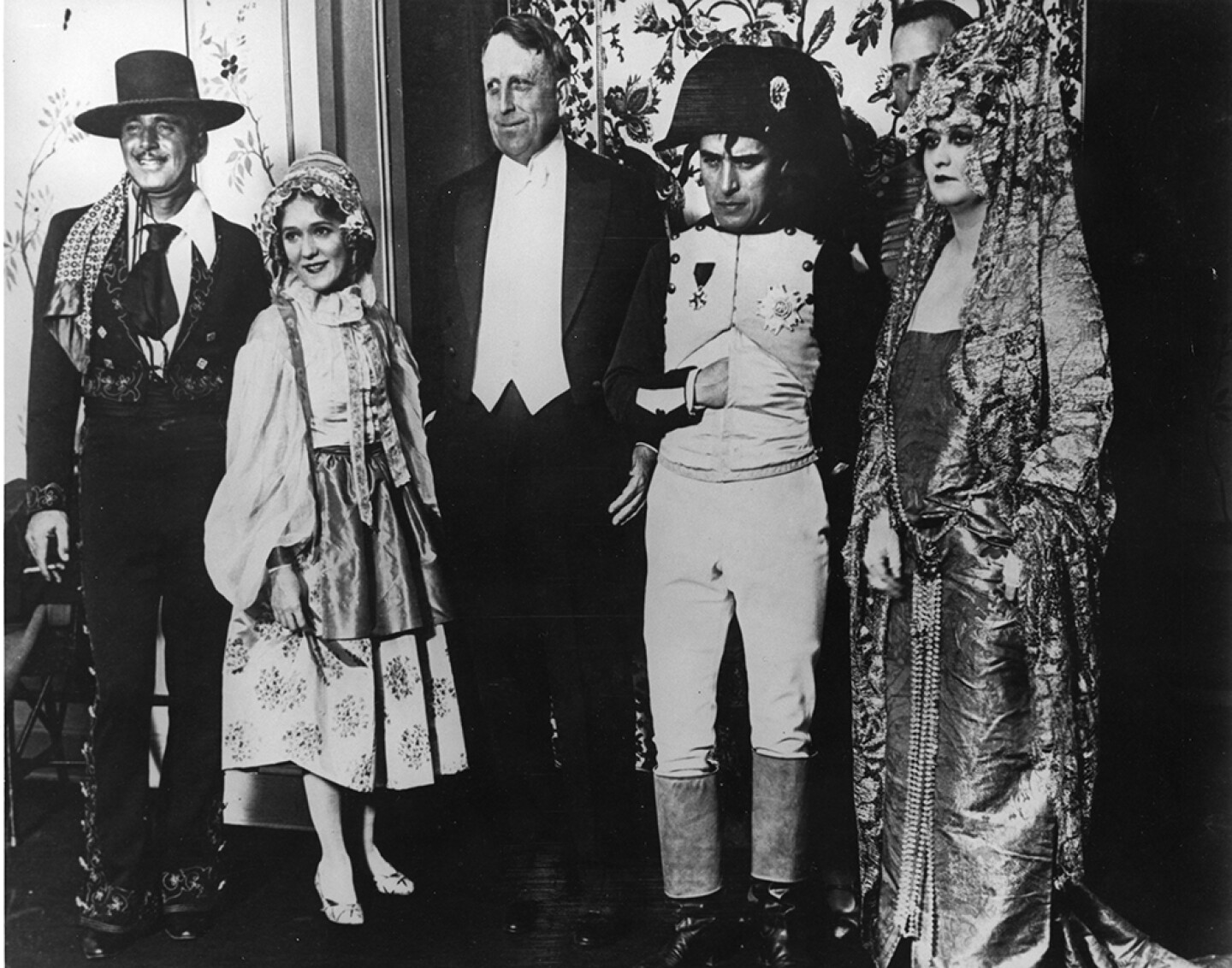 William Randolph Hearst (center in tuxedo) with party attendees (from left to right) Douglas Fairbanks, Mary Pickford, Charlie Chaplin and Princess Bibesco. (undated photo)