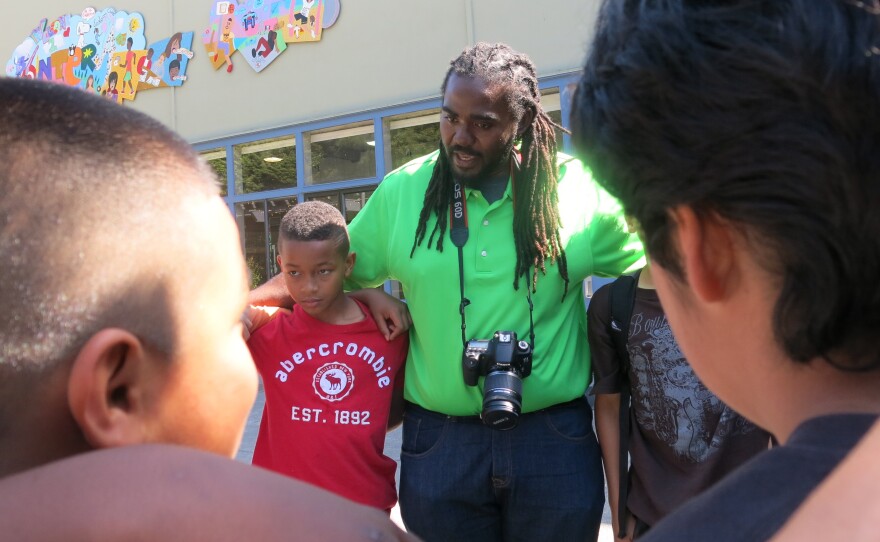 Ashanti Branch, an assistant principal at Montera Middle School in Oakland, CA leads boys in a 'check in' circle at his after school Ever Forward Club