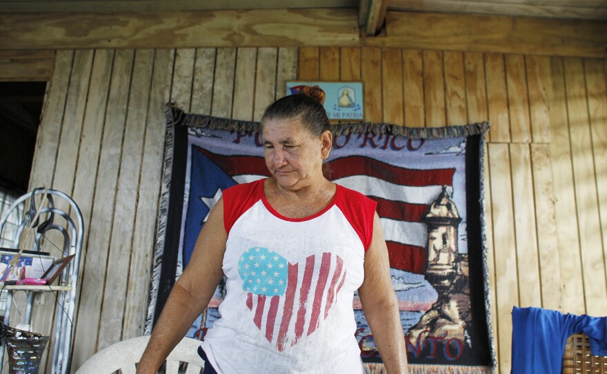 Felicita Garcia, 66, looks inside her recently repaired house, which was completely destroyed by the storm.