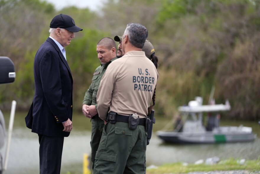 President Joe Biden talks with the U.S. Border Patrol, as he looks over the southern border, Thursday, Feb. 29, 2024, in Brownsville, Texas, along the Rio Grande. (AP Photo/Evan Vucci)