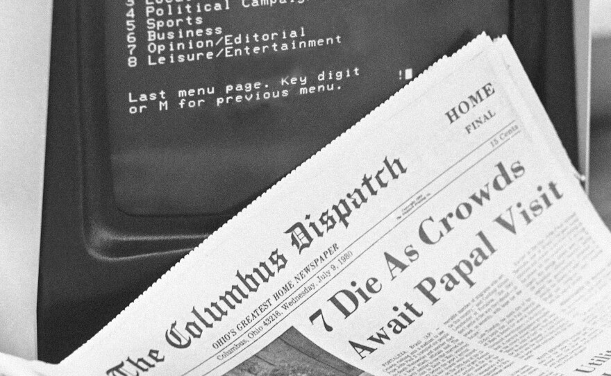 A CompuServe system shows an index of stories by the Columbus Dispatch and Associated Press on July 9, 1980.