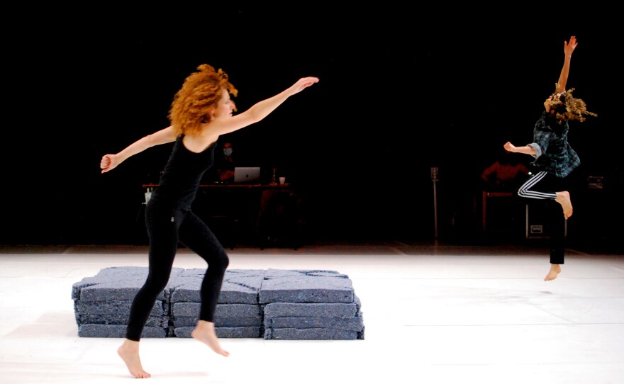 Dancer Liz Santoro, who moved to Paris 9 years ago, says France's special unemployment system for performing artists and technicians has made it possible for her to continue her work, despite a year of postponed projects and aborted plans. She's pictured above in a rehearsal with Jacquelyn Elder in November 2020.