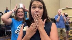 Kansas state Rep. Stephanie Clayton, an abortion rights supporter who was a Republican and is now a Democrat, reacts as a referendum to strip abortion rights out of the state constitution fails.