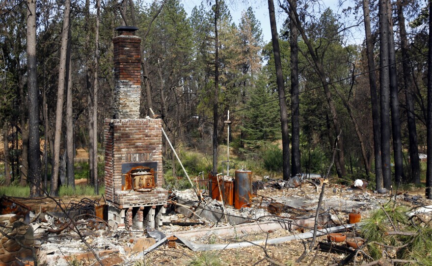 Seen in August 2019, the remains of a home destroyed in Northern California's 2018 Camp Fire.