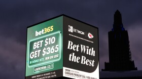 Advertisements for sports betting apps are seen in downtown Kansas City, Mo., in November.