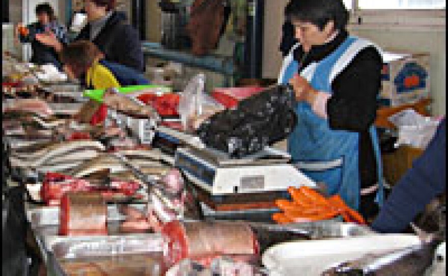A woman sells fish at a market in Yelizovo, near the capital of Petropavlovsk-Kamchatsky. Vendors say 90 percent of the fish they sell is poached.