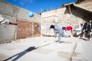 Girls play outside at the Libélula women's shelter in Tijuana, Dec. 16, 2022.