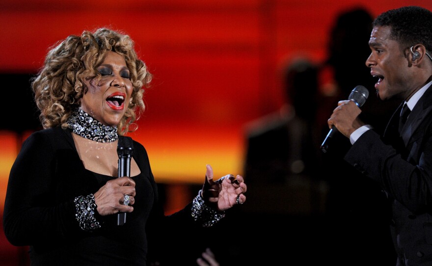 Roberta Flack (left) performs with Maxwell at the Grammy Awards in 2010.