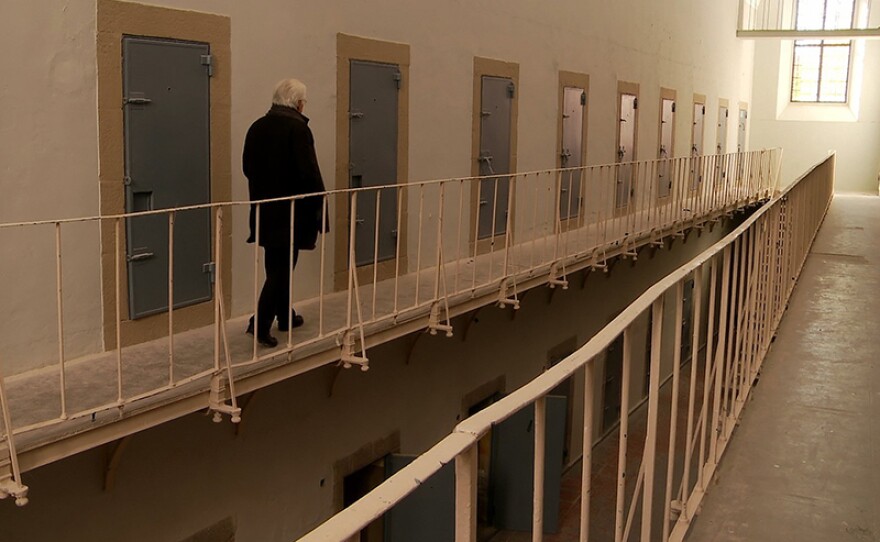 Pictured: Chato walks the corridor of a prison. Learn about the epic struggle of victims of Spain's 40-year dictatorship under Francisco Franco as they continue to seek justice four decades into democracy. Filmed over six years, the film follows the survivors organizing the groundbreaking "Argentine Lawsuit" to fight a state-imposed amnesia of crimes against humanity, where the emotional court battle uncovers a country still divided over its fascist history.