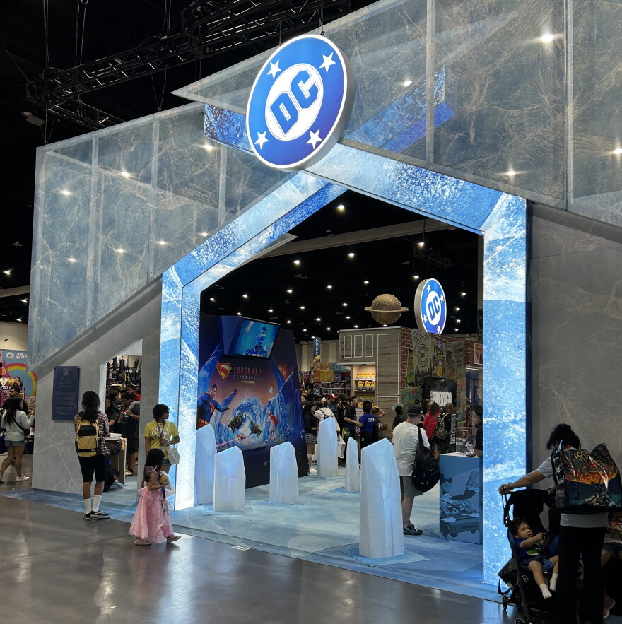 DC's Comic-Con booth focused more on its film and television projects than its comics, reflecting the changing landscape of the comics industry. July 26, 2026.