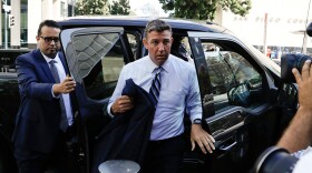U.S. Rep. Duncan Hunter, center, arrives for an arraignment hearing Thursday, Aug. 23, 2018. 