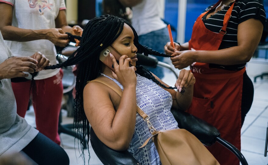 "Before 1994, survival was all about assimilating," explains Kitso Rantao, who now wears her hair naturally and had it braided for Afropunk Joburg. Straightening hair, speaking English or Afrikaans without an accent, and doing other things to remove oneself from their blackness is still seen as necessary for success.