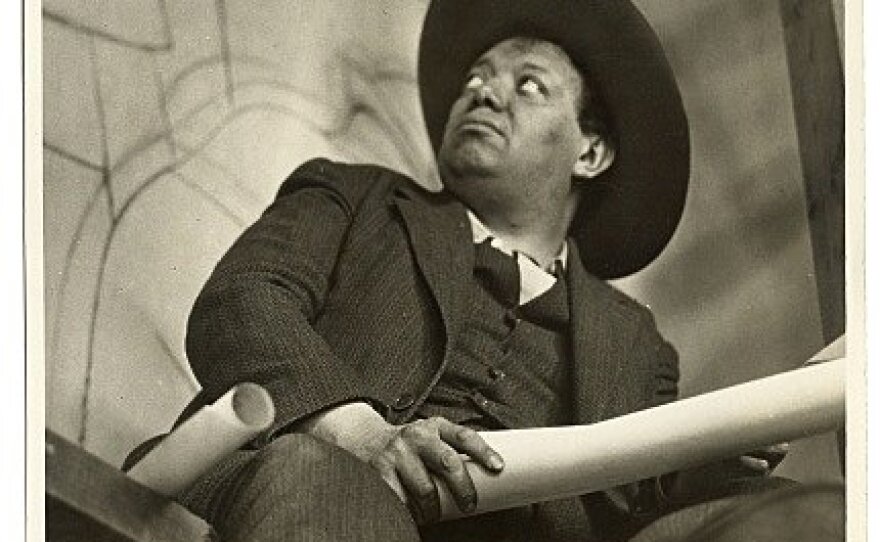 Mexican muralist Diego Rivera, whom Kahlo married twice, despite his many affairs. 