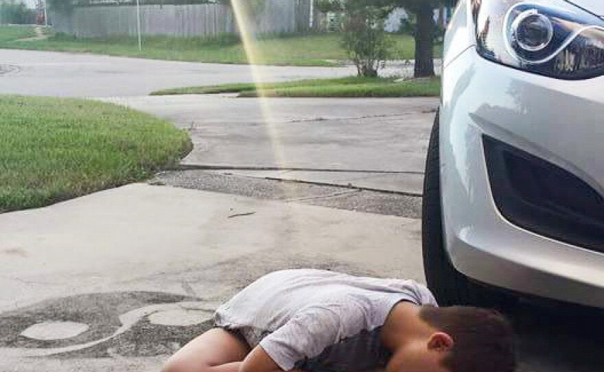 Ryan Torres, drawing in his driveway, recently went to the ER at Nemours Children's Hospital in Orlando.