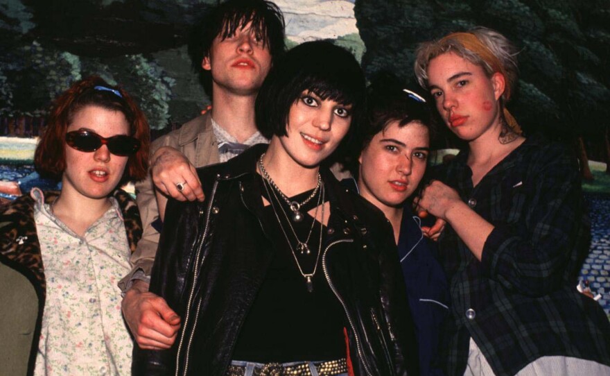 Hanna (fourth from left) poses with Joan Jett (center) and fellow with Bikini Kill members Tobi Vail, Billy Karren and Kathi Wilcox in New York City in 1992.
