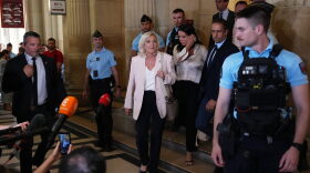 Far-right leader Marine Le Pen leaves the courtroom after the verdict of her appeal trial, in Paris, France, Tuesday, July. 7, 2026.