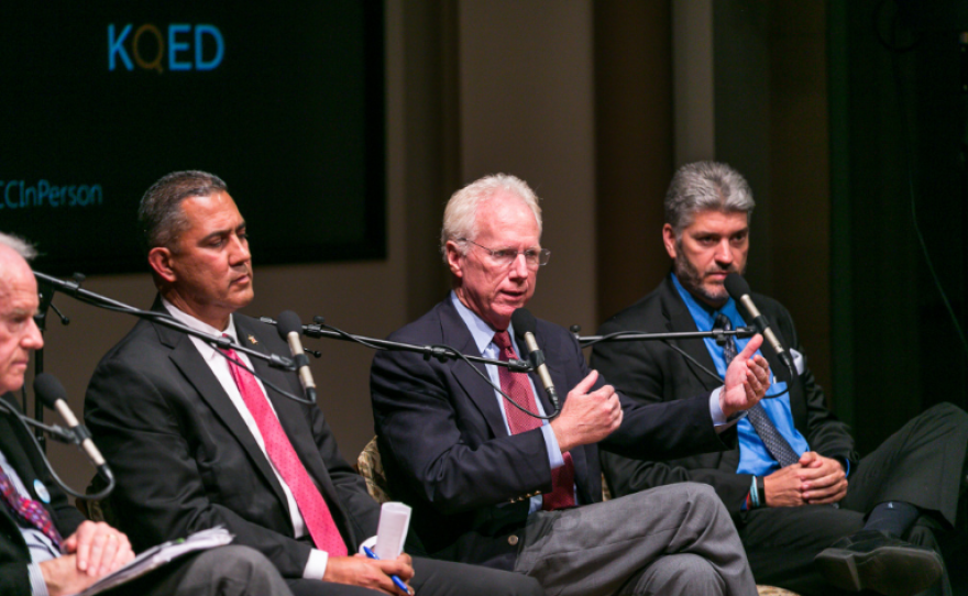 Paul Pfingst, center, speaks at a panel during a death penalty town hall at the University of San Diego, Sept. 8, 2016.