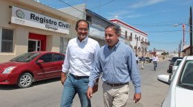 Congressional Representative Will Hurd (R-Texas) on the left with the Mayor of Ojinaga, Chihuahua Miguel Carreón in Mexico walk down a street in Ojinaga, which the State Department has warned Americans to stay out of. 
