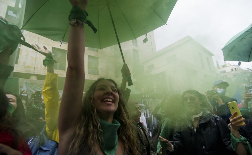 Demonstrators who support abortion rights celebrate outside the Constitutional Court in Bogota, Colombia on February 21. After an 8-hour debate, the court decriminalized abortions during the first 24 weeks of pregnancy.