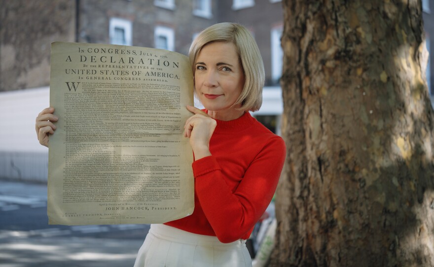 Lucy Worsley with the Declaration of Independence at Grosvenor Square.