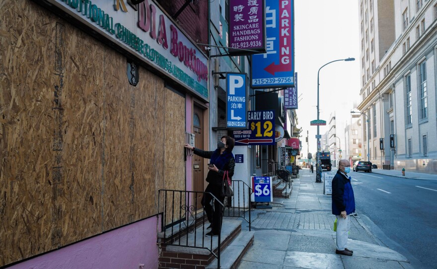 As protests broke out across the nation in 2020, many smaller businesses were looted and robbed. Here, Lai boarded up her shop, Dia Boutique.