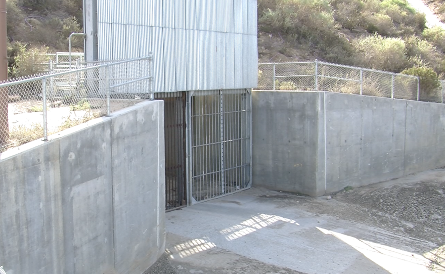 A metal grate in Smuggler's Gulch allows to flow between the U.S. and Mexico, Dec. 2, 2015. 