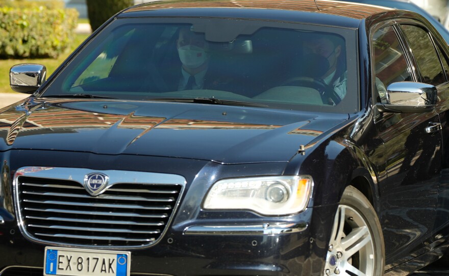 A car carrying members of the Chinese delegation leaves the Cavalieri Hilton hotel in Rome where U.S. national security adviser Jake Sullivan and Chinese foreign minister Yang Jiechi met on Monday, March 14, 2022.