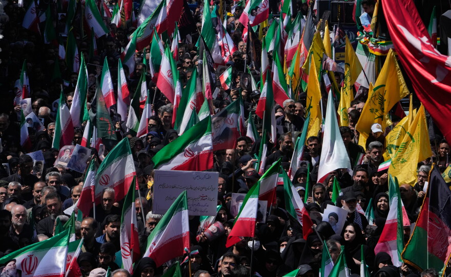 Government supporters gather to mark the 40th day since the death of Supreme Leader Ayatollah Ali Khamenei in Tehran, Iran, Thursday, April 9, 2026.