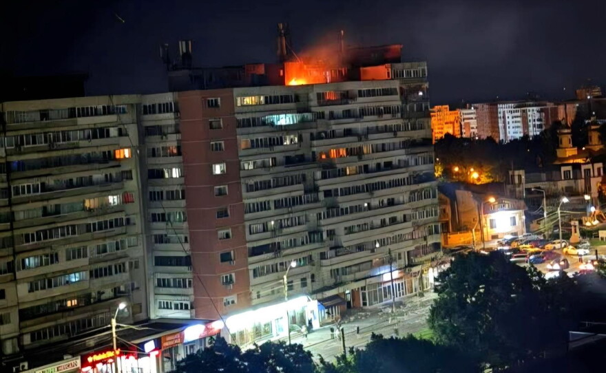 This photo released by Romania's Department for Emergency Situations shows a fire on top of a block of flats after a drone crash caused an explosion and fire on impact, in Galati, eastern Romania near the Ukrainian border, Friday May 29, 2026.