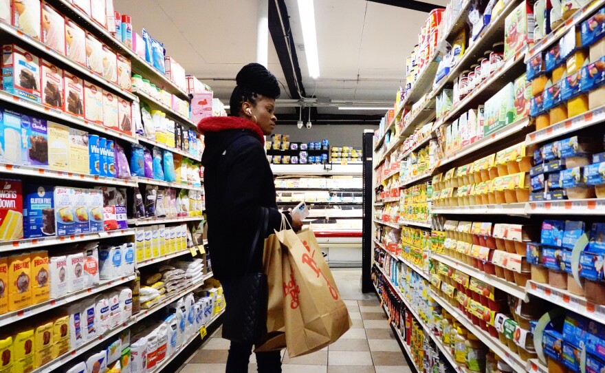 People shop for groceries in Brooklyn, New York City, on Jan. 12, 2023. Inflation is easing, but the Fed still fears it could prove more stubborn than expected.