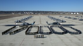 Sailors assigned to Helicopter Maritime Strike Squadron (HSM) 41, stand in formation showcasing 170,000 consecutive flight hours without a Class "A" mishap.