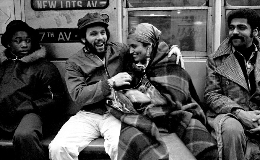 Miguel Piñero of the Nuyorican literary movement and poet Sandra Maria Esteves on the train in New York City in 1977.