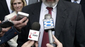 John Durham speaks to reporters on the steps of U.S. District Court in New Haven, Conn., in April 2006. Attorney General Eric Holder has picked Durham to investigate allegations of CIA mistreatment of terrorism suspects.