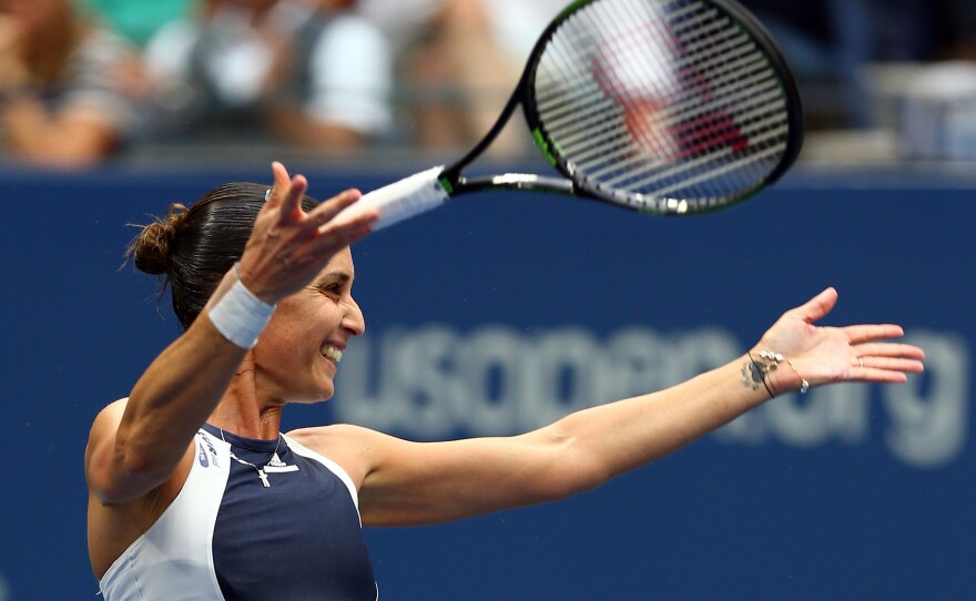 Flavia Pennetta celebrates after defeating Roberta Vinci in the women's singles final at the U.S. Open on Saturday.