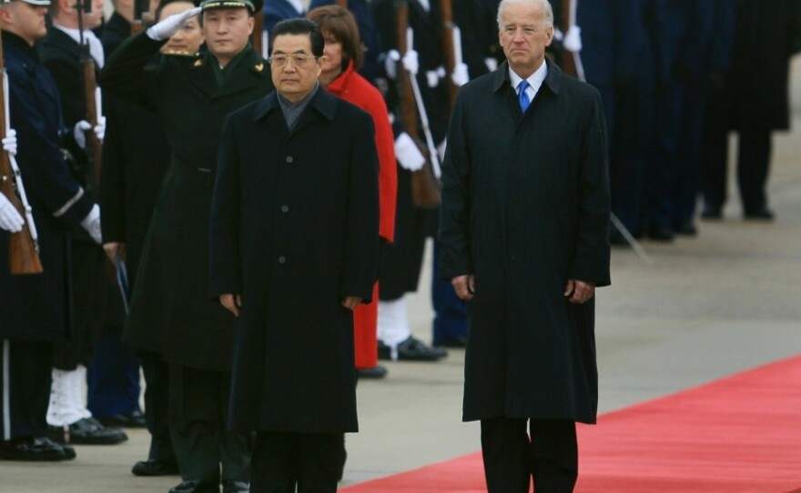 Vice President Joseph Biden welcomes Chinese President Hu Jintao to Andrews Air Force Base on Tuesday. Analysts say the Chinese leader's visit could be among the most pivotal in U.S. history. Hu meets with President Obama on Wednesday.