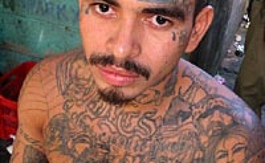 David Eurgenia, a Mara Salvatrucha member, in an El Salvador prison. "Just because we have tattoos, we get arrested... Whether we committed a crime or not, we're imprisoned."