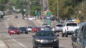 Cars fill the block of Campo Road in Casa de Oro where the Trump administration revoked a road safety grant, Sept. 30, 2025.
