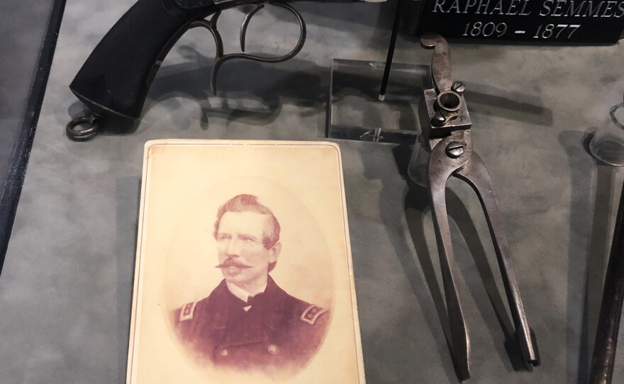 A photograph of Adm. Raphael Semmes on display with other artifacts at the History Museum of Mobile. A bronze statue of Semmes removed from prominent display in downtown Mobile has been moved to the museum where Mayor Sandy Stimpson says it can be interpreted with historical context.