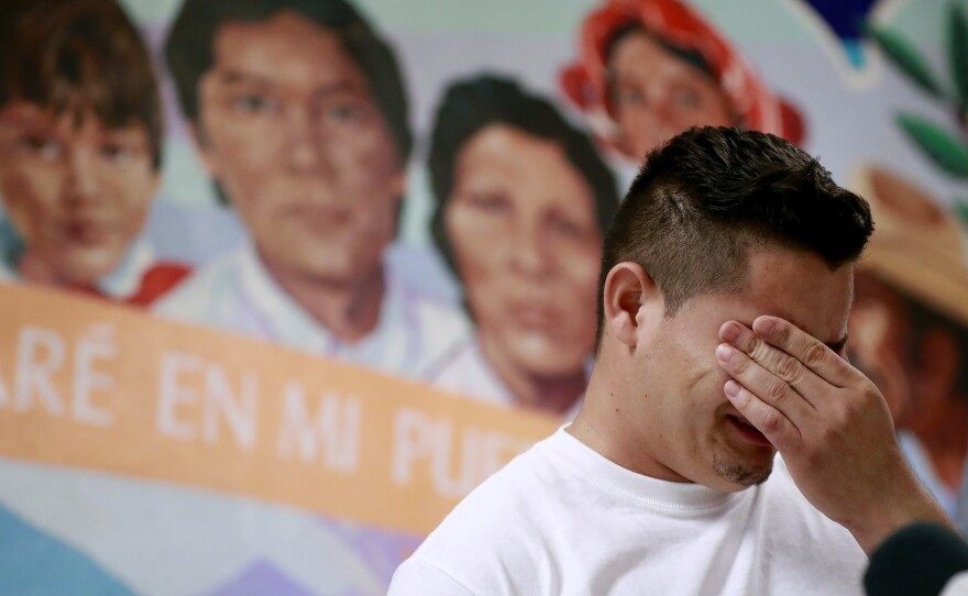 In this June 2018 photo, Christian, from Honduras, recounts his separation from his child at the border. A judge has given the federal government six months to identify children separated from their families.